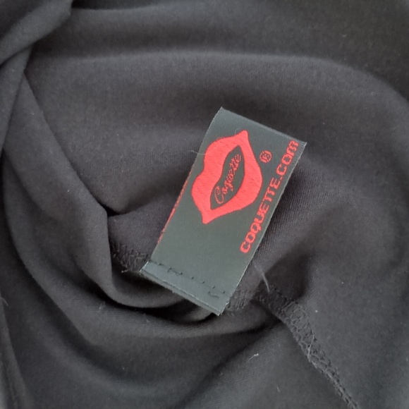 Stretchy vinyl look black miniskirt - Picture 2 of 6